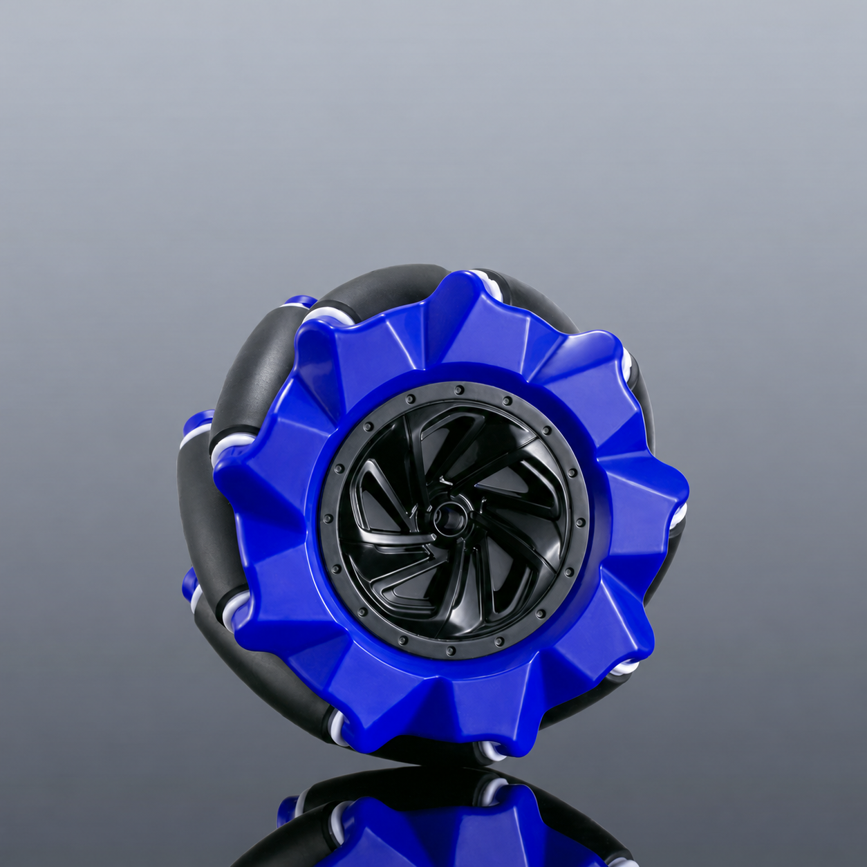 Blue Mecanum robot wheel with black centre and angled rubber rollers