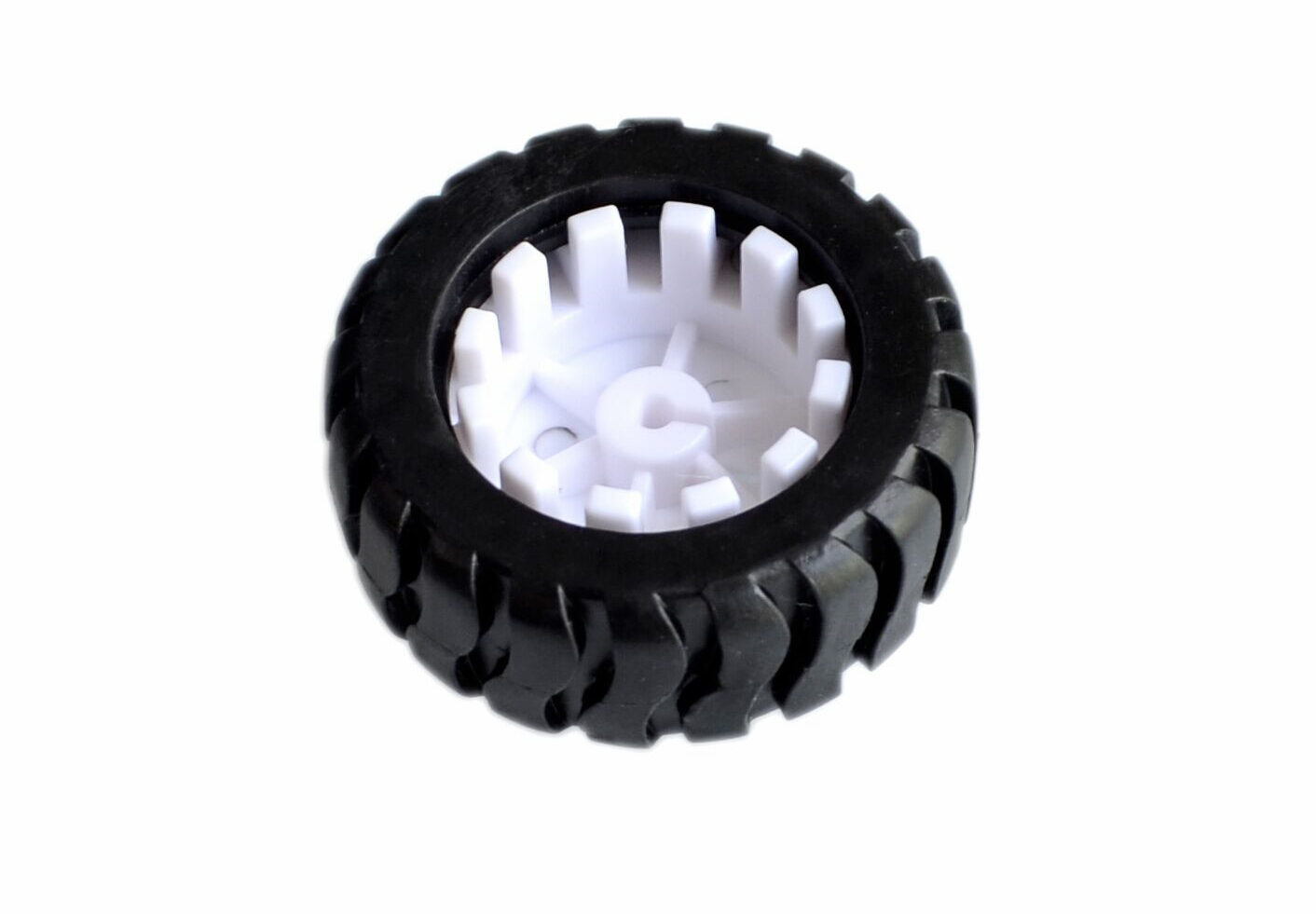 Black treaded robot tyre with a white plastic hub