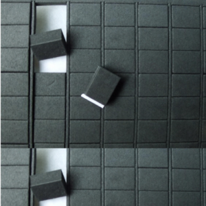 Black rectangular EVA foam pads with white adhesive backing